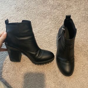 Black leather heeled boots